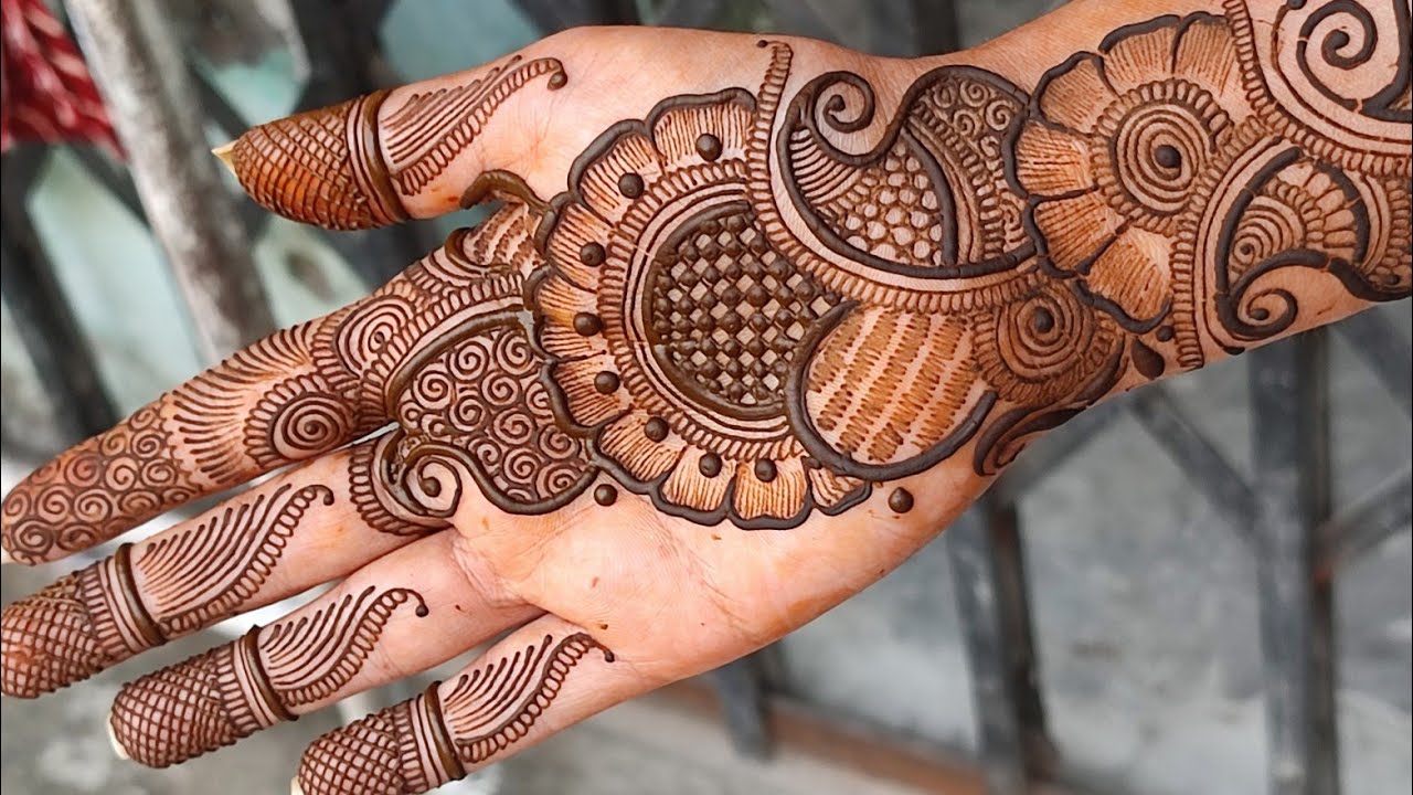 Arabic Mehndi Design - Bold Floral Motifs and Flowing Vine Style Artwork